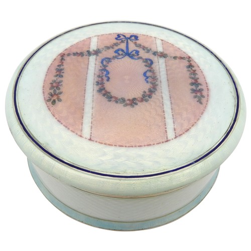 638 - A VINTAGE SILVER AND GUILLOCHE ENAMEL BOX AND COVER, CIRCA 1930, circular form, the cover decorated ... 