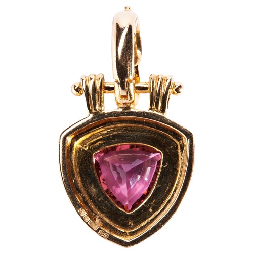 271 - A PINK TOURMALINE PENDANTa rounded trillion-cut pink tourmaline collet set in a similarly shaped gol... 