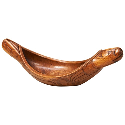 112 - A GOOD CEDARWOOD HAIDA GREASE BOWL in the Form of a Seal carved in stylised elongated flowing form w... 