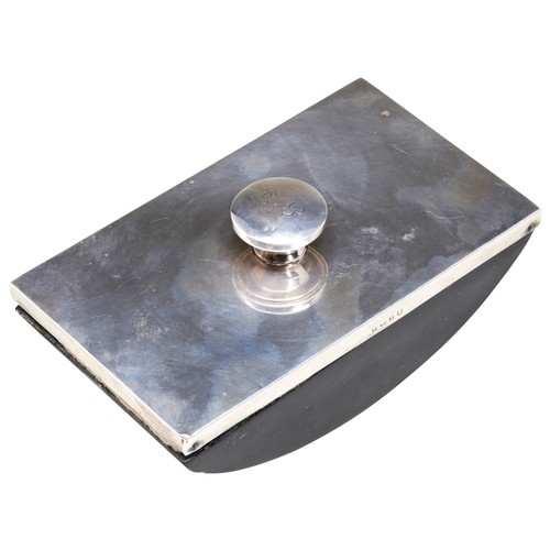 16 - A SILVER CAPSTAN INKWELL, BIRMINGHAM 1934,with liner, the hinged lid engraved ‘L.G’, and a matching ... 