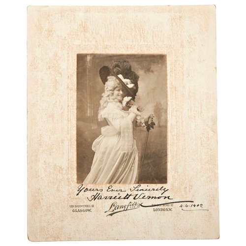 127 - HARRIETT VERNON, A SIGNED PHOTOGRAPH, POSED IN 18TH CENTURY STYLE DRESS, the inscription in ink ‘You... 