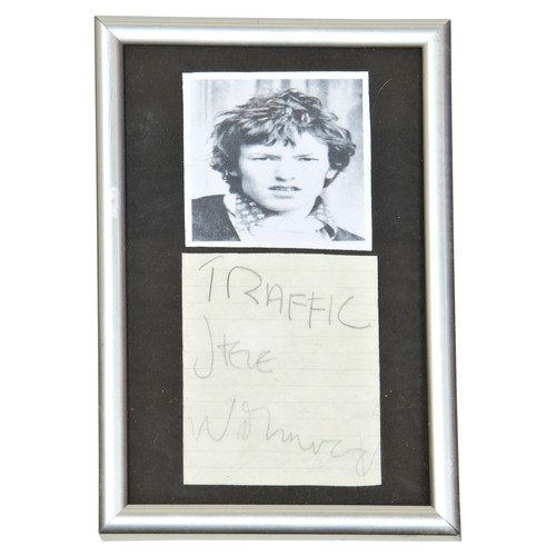 148 - STEVE WINWOOD; TRAFFIC. A PENCIL AUTOGRAPH ANNOTATED with ‘Traffic’ on a cut out piece of lined pape... 