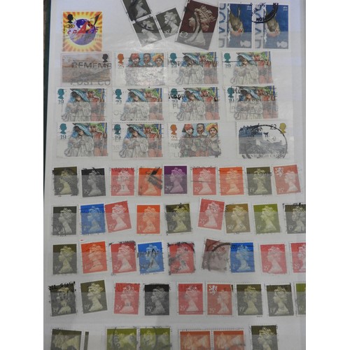 69 - AN ALBUM CONTAINING VARIOUS MAURITIAN STAMPS, another similar, three stock books containing British ... 