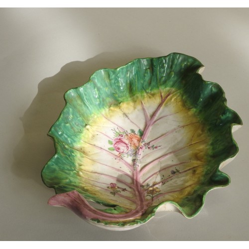 181 - A CHELSEA PORCELAIN LEAF DISH, CIRCA 1755, naturalistically modelled as an open cabbage leaf, with m... 