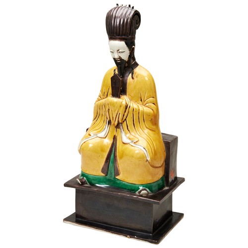 365 - CHINESE SANCAI-GLAZED SEATED OFFICIAL, KANGXI PERIOD (1664-1722)the seated official in robes with bl... 