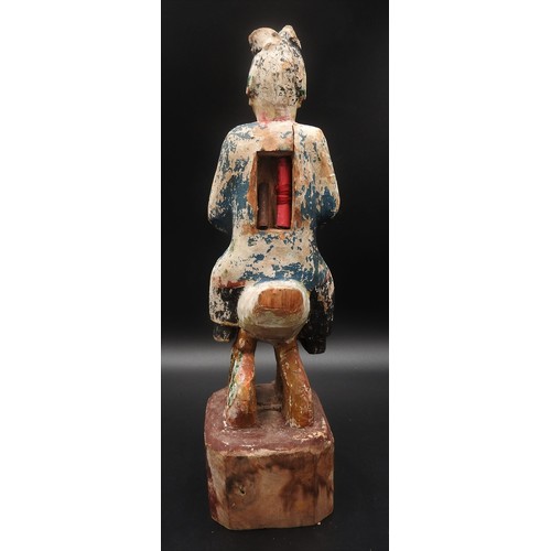 319 - AN CHINESE CARVED WOODEN POLYCHROME FIGURE, EARLY 20TH CENTURY, of a robed attendant holding a tea b... 