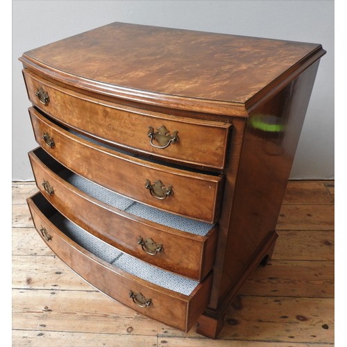 3 - A WALNUT VENEER BOW FRONT CHEST OF DRAWERS, 20TH CENTURY, in the George III manner, rectangular top ... 