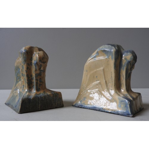 209 - A PAIR OF FRENCH ART DECO BOOK ENDS, CIRCA 1920, modelled in the form of crouching men, attractive m... 