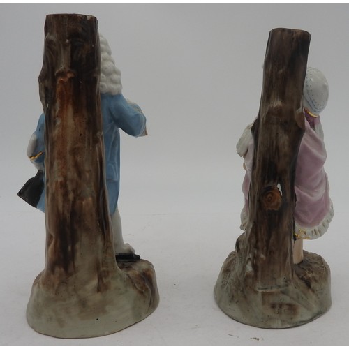 211 - A PAIR OF LATE 19TH / EARLY 20TH CENTURY CONTINENTAL PORCELAIN FIGURAL CANDLEABRA BASES, modelled as... 