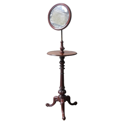 77 - A VICTORIAN MAHOGANY SHAVING STAND, CIRCA 1860,adjustable circular mirror above a circular top, on a... 