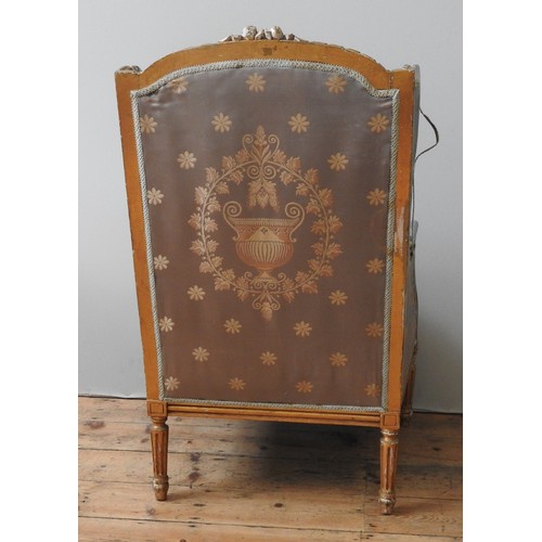 89 - A LOUIS XVI STYLE GILTWOOD WING BACK FAUTEUIL, 20TH CENTURY, high back frame with wing panel sides, ... 