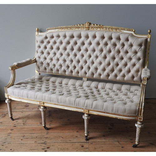 96 - A LOUIS XVI STYLE SALON SETTEE, 19TH CENTURY, elegant cream painted gilded frame with rope twist, la... 