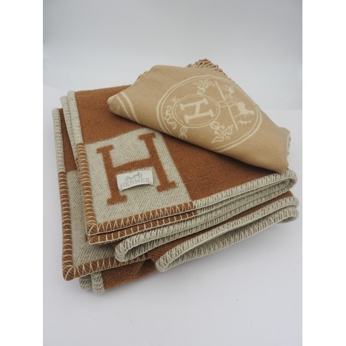 658 - A HERMES STYLE CASHMERE STOLE, and a blanket with Hermes logo. (2)