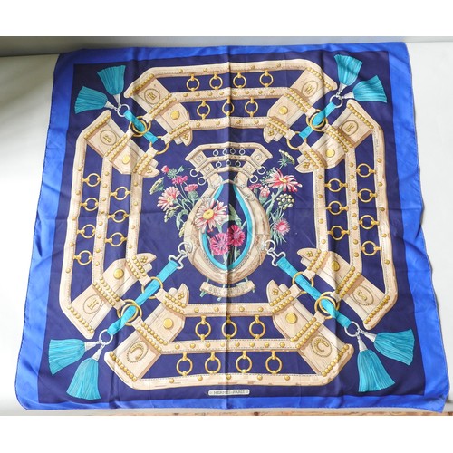 659 - TWO HERMES SILK SCARVES, comprising a blue ground 'Aux Champs', original design by Cathy Latham in t... 