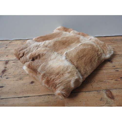 662 - A LARGE CONEY FUR AND SUEDE THROW