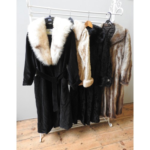 664 - FOUR VINTAGE COATS, COMPRISING AN AQUASCUTUM BLACK VELVET EXAMPLE WITH MINK COLLAR, A BLACK ASTRAKHA... 