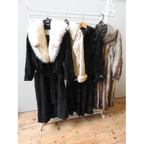 664 - FOUR VINTAGE COATS, COMPRISING AN AQUASCUTUM BLACK VELVET EXAMPLE WITH MINK COLLAR, A BLACK ASTRAKHA... 