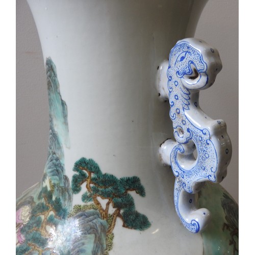 356 - A LARGE CHINESE FAMILLE ROSE BALUSTER VASE19TH / 20TH CENTURYthe slender neck with twin chilong hand... 