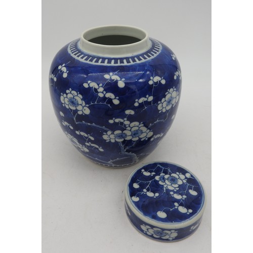 357 - A CHINESE BLUE AND WHITE GINGER JAR, LATE 19TH/EARLY 20TH CENTURY, the sides and cover with prunus d... 