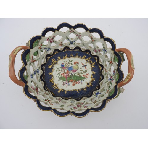 218 - AN 18TH CENTURY WORCESTER PORCELAIN BASKET, CIRCA 1770, oval form, the tapering lattice work sides d... 