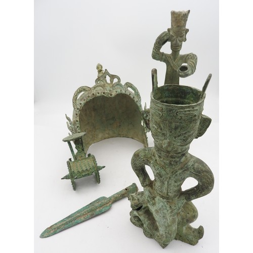 301 - A GROUP OF FIVE CHINESE ARCHAISTIC ITEMS20TH CENTURYcomprising two figures, a helmet, a spear blade ... 