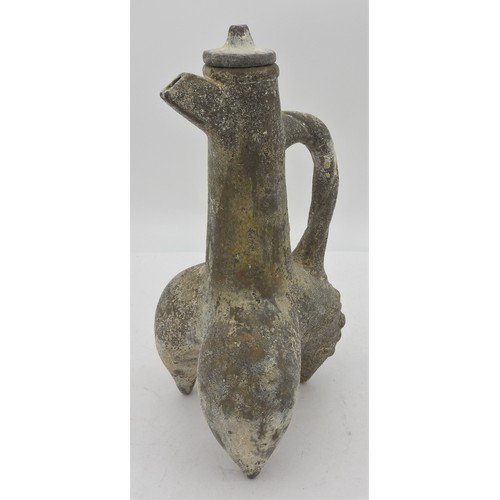 299 - A CHINESE GREY POTTERY TRIPOD VESSELPOSSIBLY NEOLITHIC with a looped rope-twist handle, angular shor... 