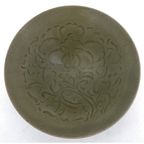 281 - A MOULDED CHINESE 'YAOZHOU' CELADON-GLAZED CONICLE BOWLPOSSIBLY NORTHERN SONG DYNASTYthe interior mo... 