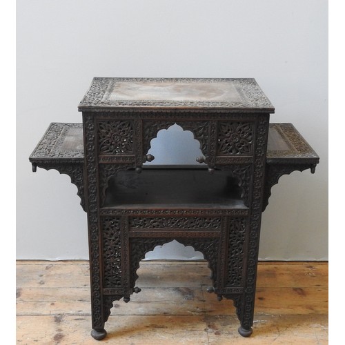 64 - A 19TH CENTURY ANGLO-INDIAN PADOUK TWO-TIER TABLE, rectangular top flanked by two lower shelves over... 