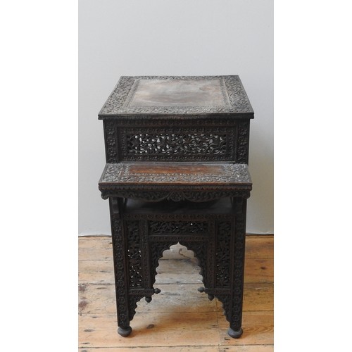 64 - A 19TH CENTURY ANGLO-INDIAN PADOUK TWO-TIER TABLE, rectangular top flanked by two lower shelves over... 