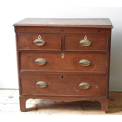 49 - AN EARLY 19TH CENTURY OAK CHEST OF DRAWERS, two short drawers over two long drawers, with ivory escu... 