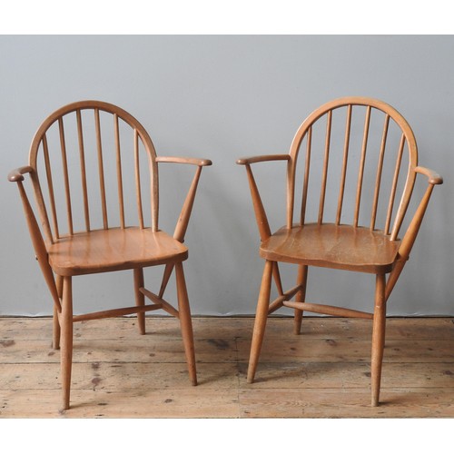 111 - A SET OF FOUR VINTAGE ERCOL 370A WINDSOR CARVER CHAIRS, CIRCA 1970, along with two matching dining c... 