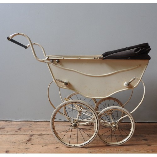 231 - A VINTAGE COACH BUILT CHILD'S PRAM, CIRCA 1955, cream coloured carriage with tan awning77 x 99 x 35 ... 