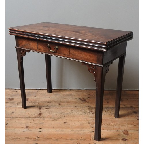 85 - AN UNUSUAL MAHOGANY TRI-FOLD TEA / CARD TABLE , EARLY 19TH CENTURY, the hinged rectangular top over ... 