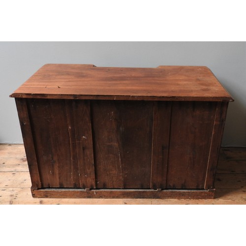 74 - A VICTORIAN MAHOGANY WRITING DESK, CIRCA 1870, breakfront rectangular top with moulded edge above a ... 