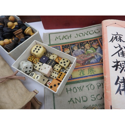 237 - A MAHJONG SET, A SELECTION OF DICE, VARIOUS MATERIALS, ASSORTED BONE LETTER COUNTERS, CHESS PIECES, ... 