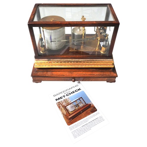 242 - A SHORT & MASON BAROGRAPH, MID 20TH CENTURY, in a glazed oak case, with associated paperwork20 x... 