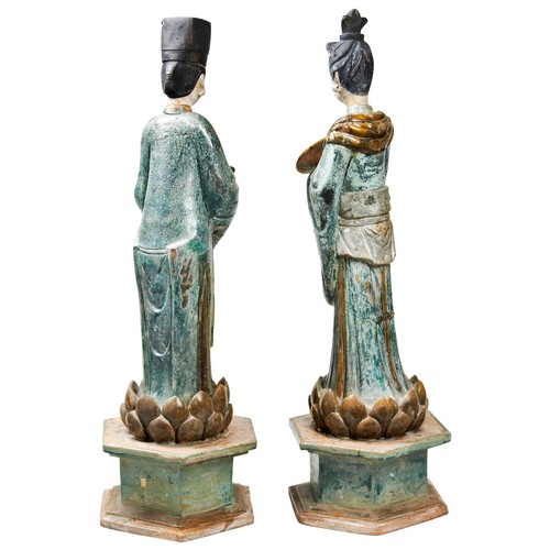 208 - A RARE PAIR OF MASSIVE CHINESE SANCAI POTTERY STANDING FIGURES OF A DIGNITARYMING DYNASTY, 16TH CENT... 