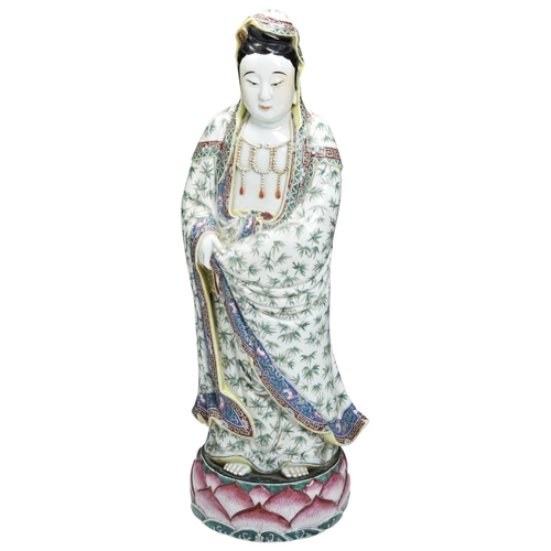 221 - LARGE FAMILLE ROSE FIGURE OF GUANYINQING DYNASTY, 19TH CENTURYthe figure standing tall atop a lotus ... 