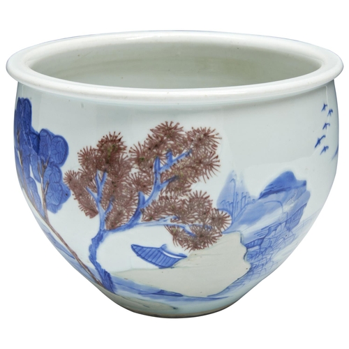 240 - AN UNDERGLAZE BLUE COPPER-RED AND CELADON-GLAZED 'LANDSCAPE' JARDINIERE KANGXI PERIOD (1662-1722)the... 