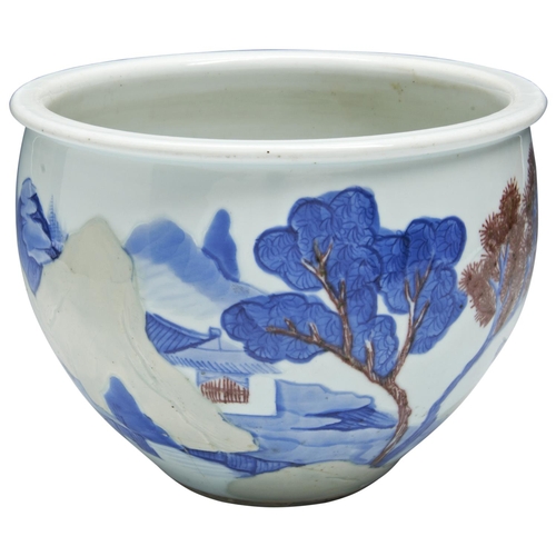 240 - AN UNDERGLAZE BLUE COPPER-RED AND CELADON-GLAZED 'LANDSCAPE' JARDINIERE KANGXI PERIOD (1662-1722)the... 