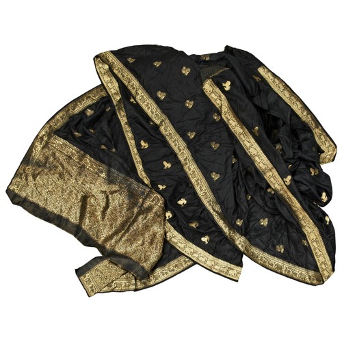 499 - AN INDIAN BLACK SILK SAREE20TH CENTURYembroidered in gilt thread with stylised animals