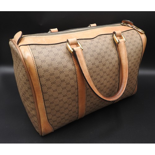 Sold at Auction: Gucci Speedy Bag