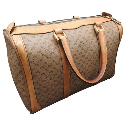 GUCCI BEIGE BOSTON BAG WITH INTERLOCKING GG LOGO AND TAN LEATHER HANDLES WITH A BLUE AND CREAM GUCCI POUCH