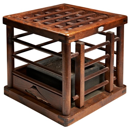 493 - A JAPANESE WOODEN KOTATSULATE MEIJI / TAISHO P[ERIOD with a pottery coal tray33cm wide... 