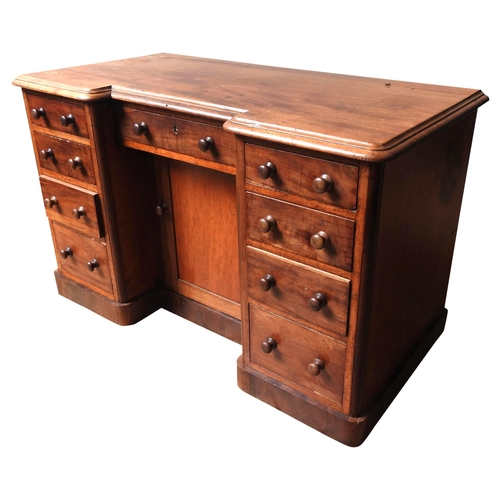 53 - A VICTORIAN MAHOGANY WRITING DESK, CIRCA 1870, breakfront rectangular top with moulded edge above a ... 