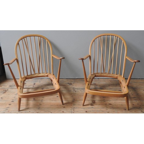 88 - AN ERCOL 'WINDSOR' SETTEE FRAME AND TWO ARMCHAIR FRAMES, CIRCA 1960, constructed from beech and elm,... 