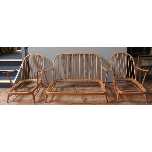 88 - AN ERCOL 'WINDSOR' SETTEE FRAME AND TWO ARMCHAIR FRAMES, CIRCA 1960, constructed from beech and elm,... 