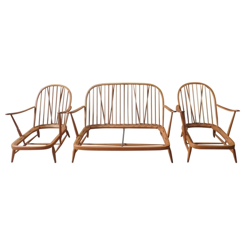 88 - AN ERCOL 'WINDSOR' SETTEE FRAME AND TWO ARMCHAIR FRAMES, CIRCA 1960, constructed from beech and elm,... 