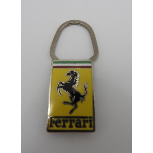 482 - PERIOD FERRARI KEYRING AND PIN BADGERare period Ferrari item, new/old stock and still in waxed paper... 