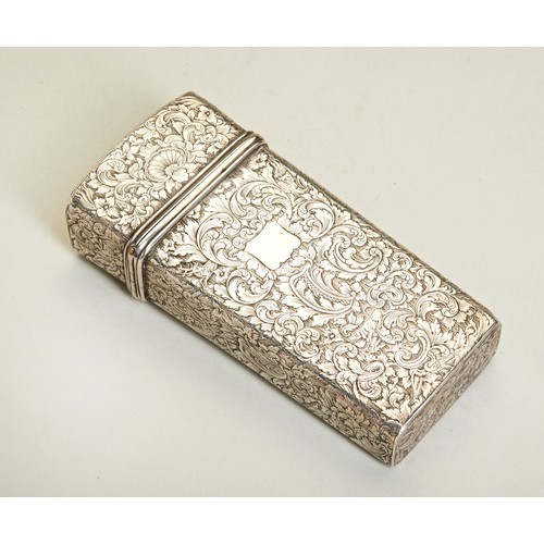 114 - AN ENGRAVED KEYSTONE SHAPED CHEROOT CASE, CALCUTTA C.1840. A cheroot case covered with floral engrav... 